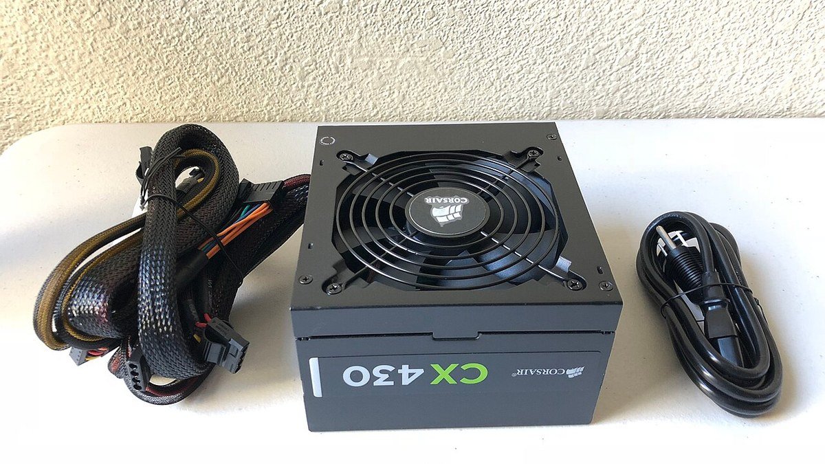 A modular Corsair PC power supply with its cables